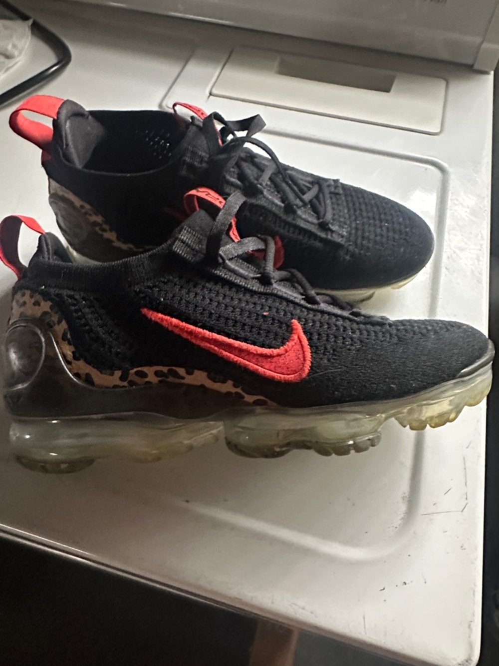 Nike Black Knit VaporMax Sneakers with Red Swoosh